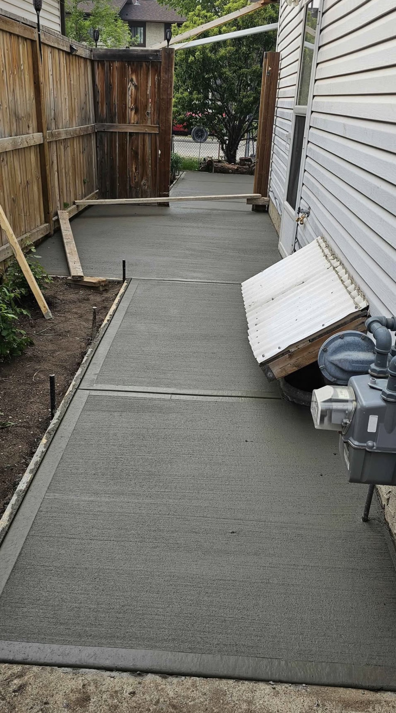 Side yard concrete walkway — MCS Solutions